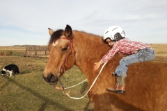 Candy gets lots of love from her little girl.